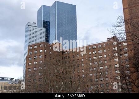 The NYCHA Elliot Houses complex of apartments in Chelsea, with the Manhattan West and Eugene buildings behind it,  in New York on Saturday, February 25, 2023.  (© Richard B. Levine) Stock Photo