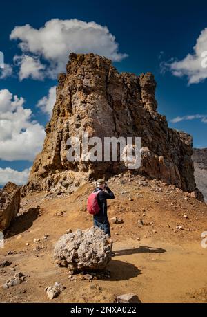 Male photographer on the Tongariro alpine crossing, Stock Photo