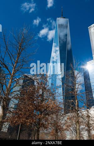 Low angle view of One World Trade Center against cloudy sky Stock Photo