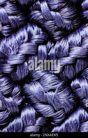 Loops on a knitted blue fabric, background or texture Stock Photo