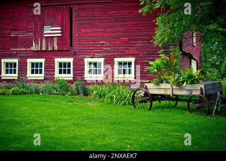 Scenic barn and decorative flag near Ludington, Michigan, USA Stock Photo