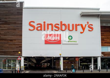 Slough, Berkshire, UK. 1st March, 2023. A Sainsbury's supermarket with an Argos store in Slough, Berkshire. Sainsbury's are reported to be planning on closing two Argos depots over the next three years in a bid to cut costs. The closures are expected to impact upon more than 1,400 jobs. The plan is close the Argos warehouse in Basildon, Essex, and a depot in Heywood, Greater Manchester by 2026. Credit: Maureen McLean/Alamy Live News Stock Photo