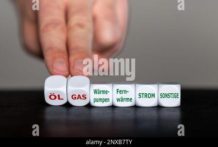 Symbol for the ban of oil and gas heating systems in Germany. Cubes form the German words 'Oel, Gas, Waermepumpen, Fernwaerme, Strom, Sonstige' (oil, Stock Photo