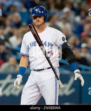 Toronto Blue Jays Josh Donaldson (L), Troy Tulowitzki (C), and Ryan Goins  celebrate defeating the Cleveland Indians in game four of the American  League Championship Series at Rogers Centre on October 18