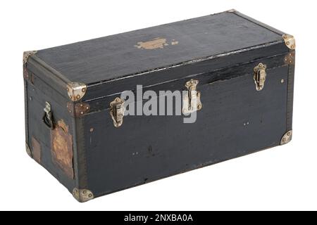 An old fashioned wooden trunk. A black trunk with metal reinforced corners and leather trimmed edges. Stock Photo