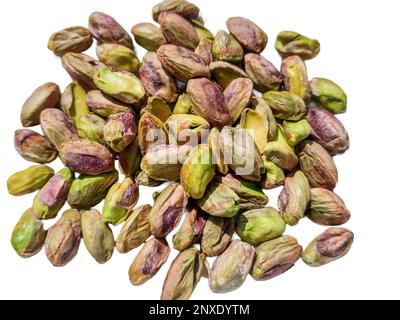 peeled pistachios isolated on white background Stock Photo