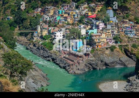 Hotels and resorts of Devprayag, Garhwal, Uttarakhand, India. Bhagirathi river from left side and Alakananda river with turquoise blue colour from rig Stock Photo