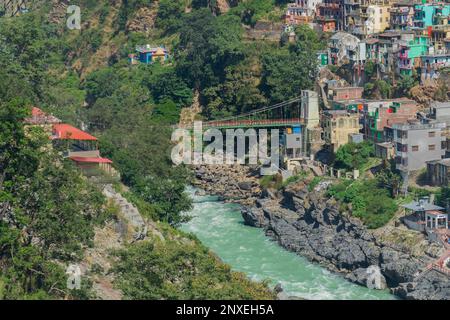 Bridge at Devprayag, Bhagirathi river from left side and Alakananda river from right side converge at Devprayag,Holy conflunece and form river Holy Ga Stock Photo