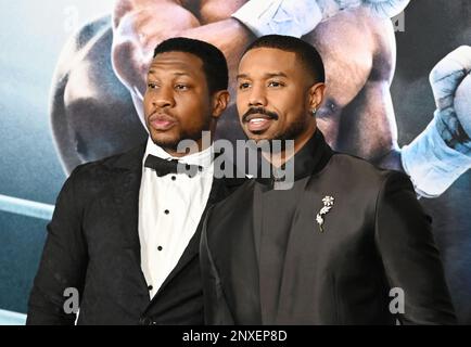 HOLLYWOOD, CALIFORNIA - FEBRUARY 27: (L-R) Jonathan Majors and Michael B. Jordan attend the Los Angeles Premiere of 'CREED III' at TCL Chinese Theatre Stock Photo