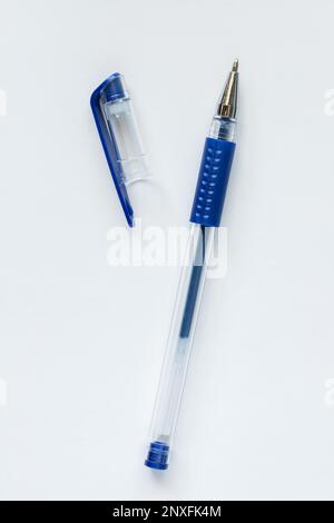 Blue gel pen with open pen cap on white background Stock Photo
