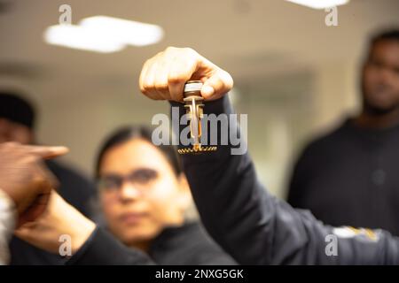 Fire Alarm training class by security guard in office Stock Photo