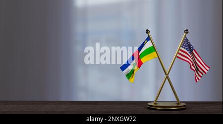 Central African Republic and USA flags on table. Negotiation between Central African Republic and United States. on little blur background. 3D work an Stock Photo