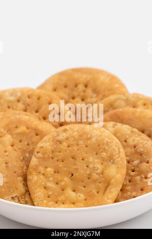 Namkeen Masala Mathri Also Called Matthi, Mathiya, Mathi, Farsi Poori, Farsan, Pharsaṇ Or Mathari Is Famous Tea Time Gluten Free Snacks Consumed Mostl Stock Photo