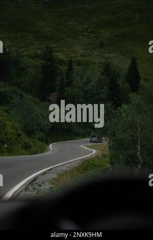 View on road from car window in mountains in Alps Stock Photo