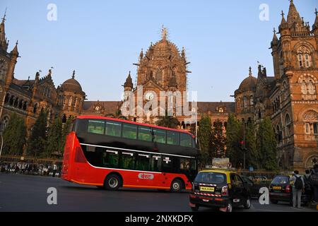 Mumbai, India. 01st Mar, 2023. An airconditioned electric double decker bus drives past Chhatrapati Shivaji Maharaj Terminus (CSMT) building in Mumbai. The bus ferries office-goers on the route from Chhatrapati Shivaji Maharaj Terminus (CSMT) to Nariman Point. (Photo by Ashish Vaishnav/SOPA Images/Sipa USA) Credit: Sipa USA/Alamy Live News Stock Photo