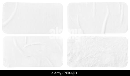 Set of four crumpled paper sheets, each of which is isolated on white background. Rectangle shape has rounded edges. Template mockup Stock Photo