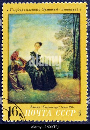 Cancelled postage stamp printed by USSR, that shows painting Sick Woman and a Doctor, Jan Steen (1660's), circa 1973. Stock Photo