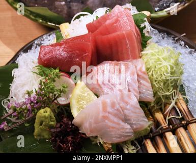 Sashimi of Kindai(white) and Kindai Tuna(red) are offered at Kindai ...