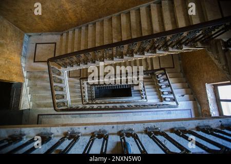 Top view of old vintage decorated staircase in abandoned mansion. Stock Photo