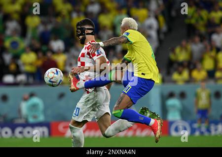 Neymar Jr. (Brazil) battles Joško Gvardiol (Croatia) for the ball in Croatia's 1-1 (4-2) quarter-final victory over Brazil in the 2022 FIFA World Cup. Stock Photo