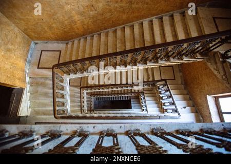 Top view of old vintage decorated staircase in abandoned mansion. Stock Photo