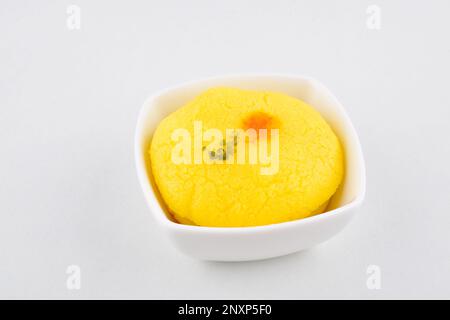 Cham Cham sweet in bowl isolated on white background Stock Photo