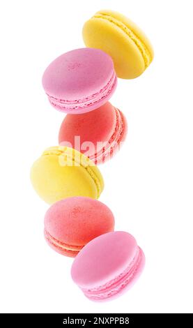 Red, pink and yellow macaroons levitating isolated on white background Stock Photo