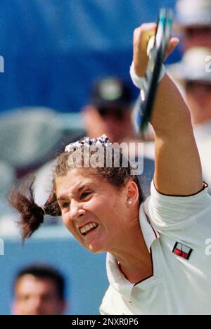 Monica Seles serves as she competes in the U.S. Open Tennis tournament in  New York, September 2, 1995. Seles is a Yugoslav-born, ethnic Hungarian,  American former world number one professional tennis player