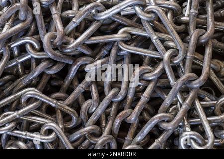 old steel chain pile background detail with some rust Stock Photo