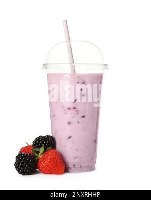 Premium Photo  Milkshake with strawberry pieces, in plastic cup, delicious  and fresh