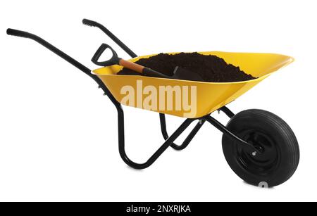 Yellow wheelbarrow with soil and shovel isolated on white. Gardening tools Stock Photo