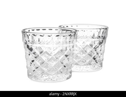 Two modern glass candle holders on white background Stock Photo