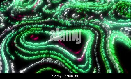 Black background with bright yellow and green backlight. Motion.Bright background with burning particles around in animation. High quality 4k footage Stock Photo
