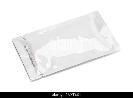 Shiny Plastic Packet Cut Out on White. Stock Photo