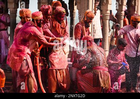 Mathura, India. 01st Mar, 2023. MATHURA, INDIA - MARCH 1: People smear each-other with coloured powder during the Lathmar Holi festival, at Nandji Temple on March 1, 2023 in Mathura, India. The lathmar Holi recreates the legendary visit of Lord Krishna, who was a native of Nandgaon, to the town of Barsana, where his beloved Radha lived. When the lord teased Radha and her friends, they responded with sticks (Photo by Raj K Raj/Hindustan Times/Sipa USA) Credit: Sipa USA/Alamy Live News Stock Photo