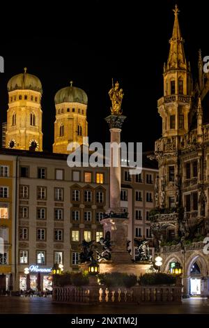 Mariensaeule, the golden holy Mary statue on a column erected in 1638 at Marienplatz in Munich Stock Photo