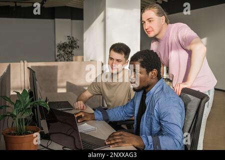 Team of professional software developer and brainstorming and programming on site, software and technology work. Coding technologies, site design Stock Photo