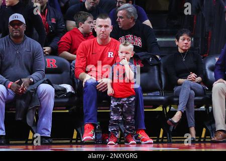 PISCATAWAY, NJ - NOVEMBER 28: Former Rutgers baseball star Todd Frazier and  his son Blake Frazier during the first half of the BIG 10 ACC Challenge  College Basketball game between the Rutgers