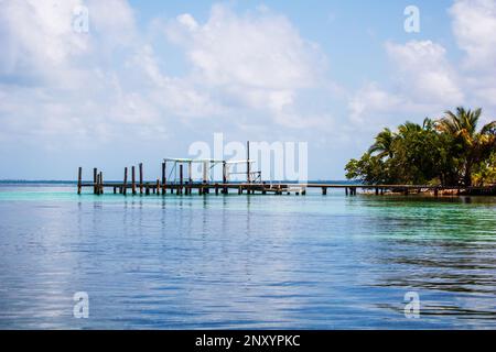 Dock on island of South Water Caye Marine Reserve in Belize Barrier Reef Stock Photo