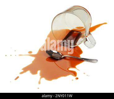 Overturned cup and spilled coffee on white background Stock Photo