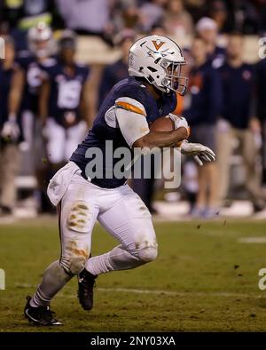 ANNAPOLIS, MD - DECEMBER 28: Virginia Cavaliers wide receiver Andre Levrone  (14) fumbles a pass during the Military Bowl football game between Navy and  Virginia at Navy - Marine Corps Memorial Stadium