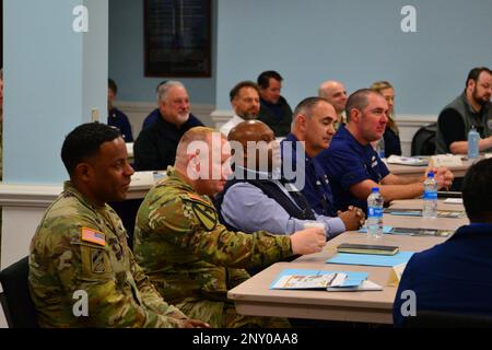 FEMA Deputy Administrator Erik Hooks listens to briefing provided by Military Ocean Terminal Sunny Point (MOTSU) staff about operations and projects that are upcoming to aid in emergency preparedness.  Col Chad J. Blacketer, Commander of 596th Transportation Brigade at Sunny Point hosts the event and tour for the FEMA delegation 12JAN2023. Stock Photo