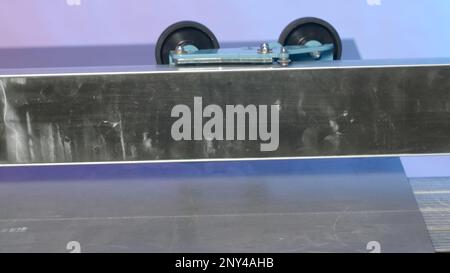 Modern Plate Cutting Machine. Creative. Manual machine for cutting large-format plates. Machine with leveler for cutting plates. Stock Photo