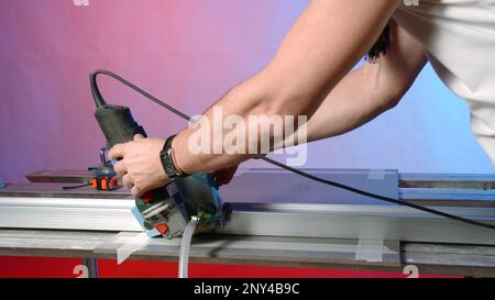 Modern Plate Cutting Machine. Creative. Manual machine for cutting large-format plates. Machine with leveler for cutting plates. Stock Photo