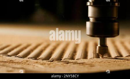 Cutter. Creativity. Production with the help of a special tool that performs a rotational movement, thereby cutting. High quality 4k footage Stock Photo