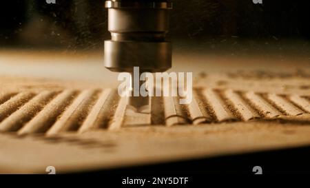 Cutter. Creativity. Production with the help of a special tool that performs a rotational movement, thereby cutting. High quality 4k footage Stock Photo