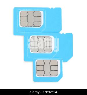 Light blue SIM cards on white background, top view Stock Photo