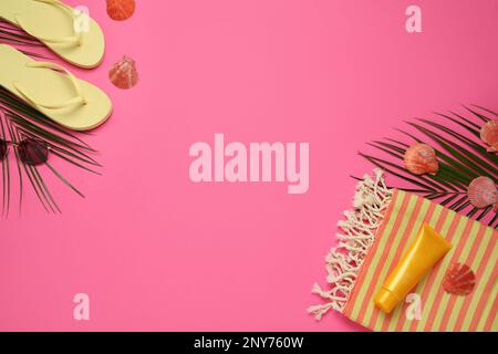 Flat lay composition with different beach objects on pink background, space for text Stock Photo