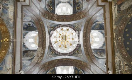 Bottom view of a church beautiful decorated ceiling. Action. Interior of a temple, concept of religion Stock Photo