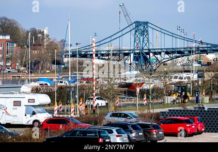 Wilhelmshaven, Germany. 01st Mar, 2023. The historic Kaiser Wilhelm Bridge stands in the city's harbor in sunny weather. The double swing bridge made of riveted steel truss is the landmark of the city of Wilhelmshaven. Credit: Hauke-Christian Dittrich/dpa/Alamy Live News Stock Photo